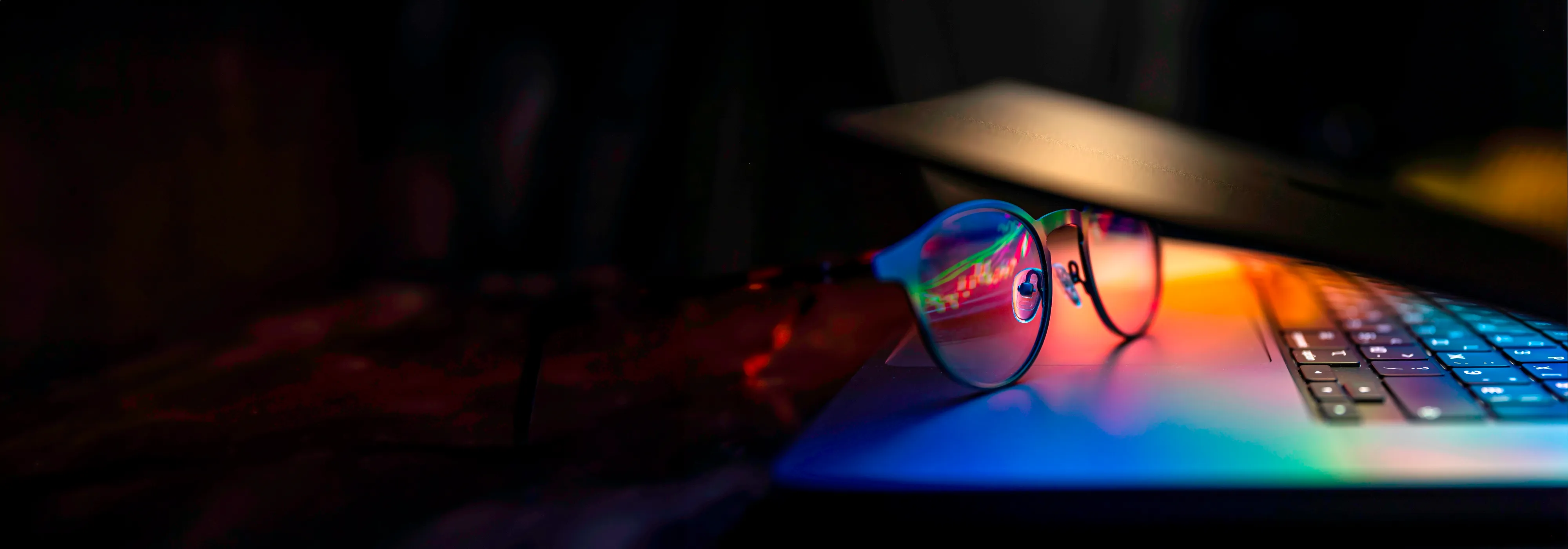 Laptop and glasses representing digital privacy